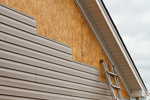 Professional Siding Replacement technician working in Grove City, OH